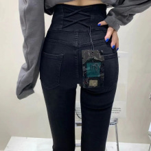 高腰牛仔裤女2025秋季新款大码后面交叉带收腰显瘦弹力铅笔小脚裤