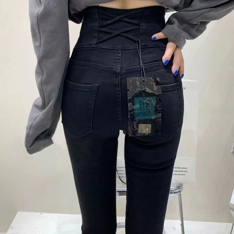 高腰牛仔裤女2025秋季新款大码后面交叉带收腰显瘦弹力铅笔小脚裤