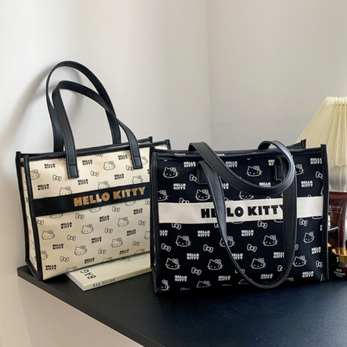 HelloKitty genuine new canvas portable toiletry bag cosmetic bag large capacity tote bag mommy bag women's bag