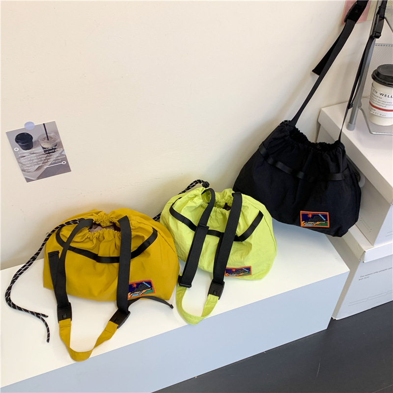 Bolso de hombro para bebé coreano de gran capacidad Bolso de mensajero para niños con cordón de aire extranjero Bolso para niños de viajes deportivos de ocio