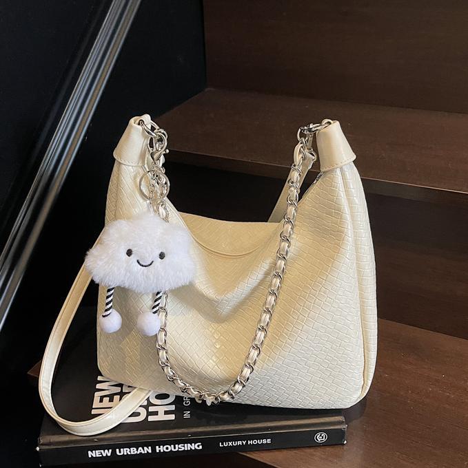 Bolso de axila para mujer 2025 nuevo bolso de hombro de moda de nicho de tejido popular bolso de mensajero de estilo occidental simple de gran capacidad