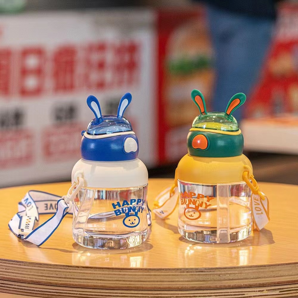 Tianyi 0932 nuevo espacio para niños taza feliz Orejas de conejo taza de plástico transparente Correa al aire libre paja taza de plástico
