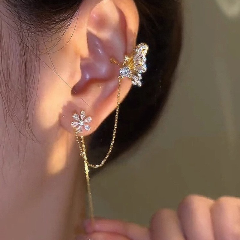 Mariposa amor flor oído hueso clip oreja línea integrada pendientes nicho diseño de alto grado de luz de lujo clip de oreja temperamento borla pendientes