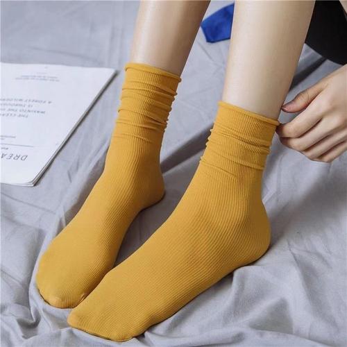Summer thin ice socks in candy-colored black and white, long-length JK-style socks—trendy Japanese-style mid-calf velvet pile-up socks for students.