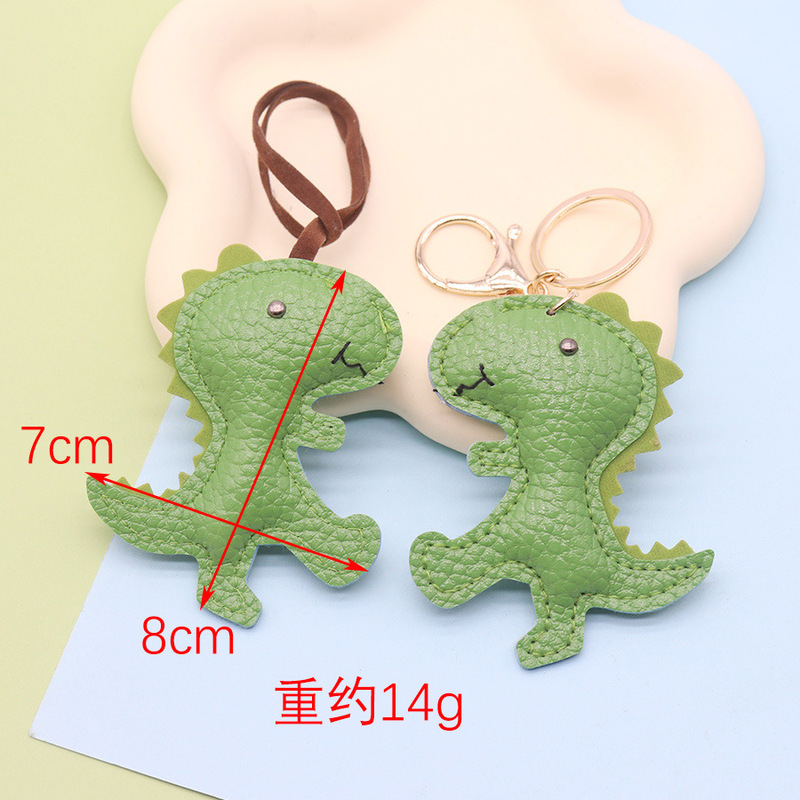 Factory direct middle school student bag dinosaur pendant key chain cute green dinosaur fashion key chain wholesale