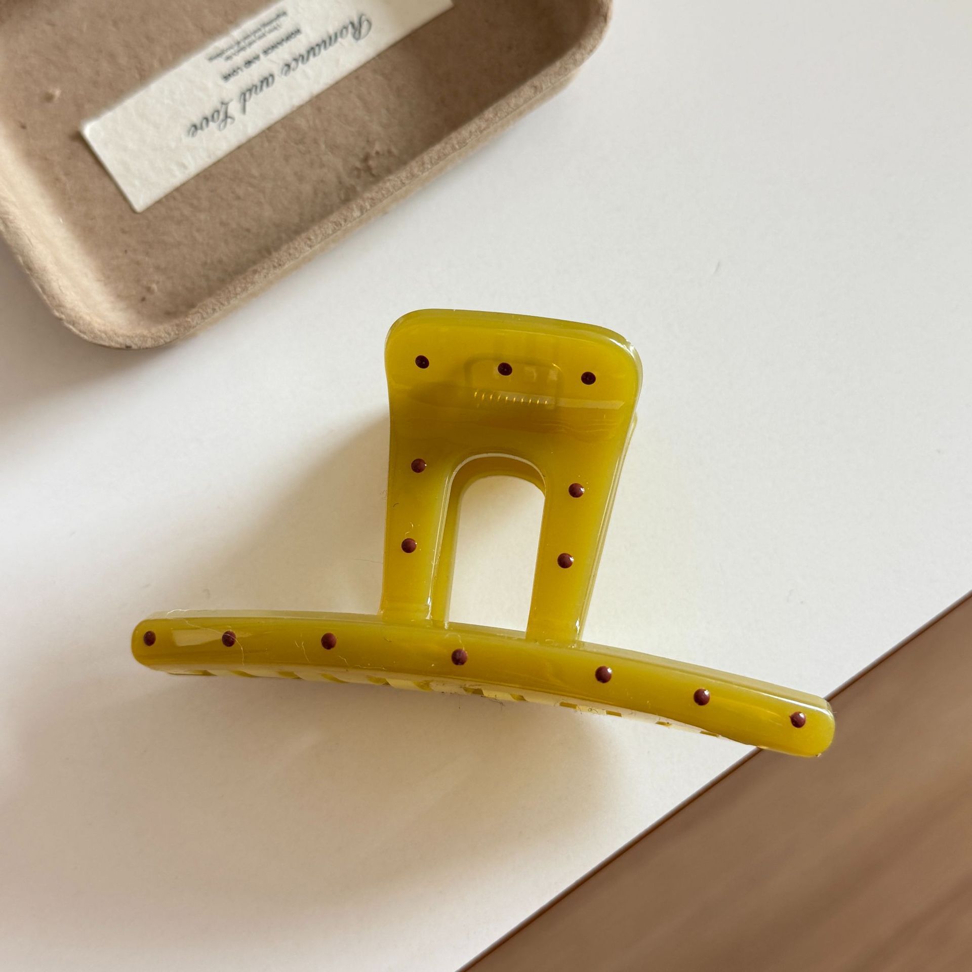 Mustard yellow polka dot word