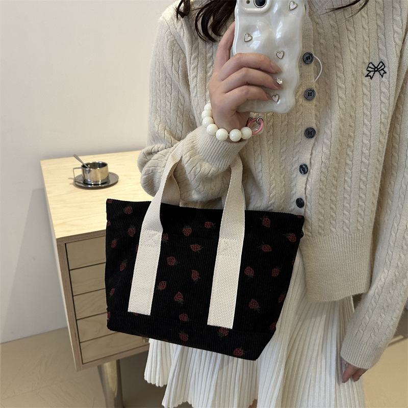 2024 otoño nueva gran capacidad simple moda encantadora impresión de fresas de moda coreana bolsos de chicas de estilo universitario