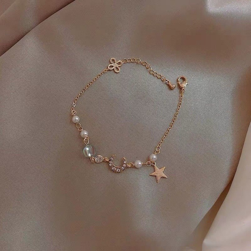 Bracciale da donna di design, trendy, alla moda, semplice, con stelle e luna in zirconi, perle di lusso di nicchia._voghion.com