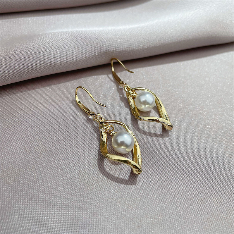 Joyas Pendientes De Circonita Perla De Metal Giratorio Temperamento Simple display picture 3