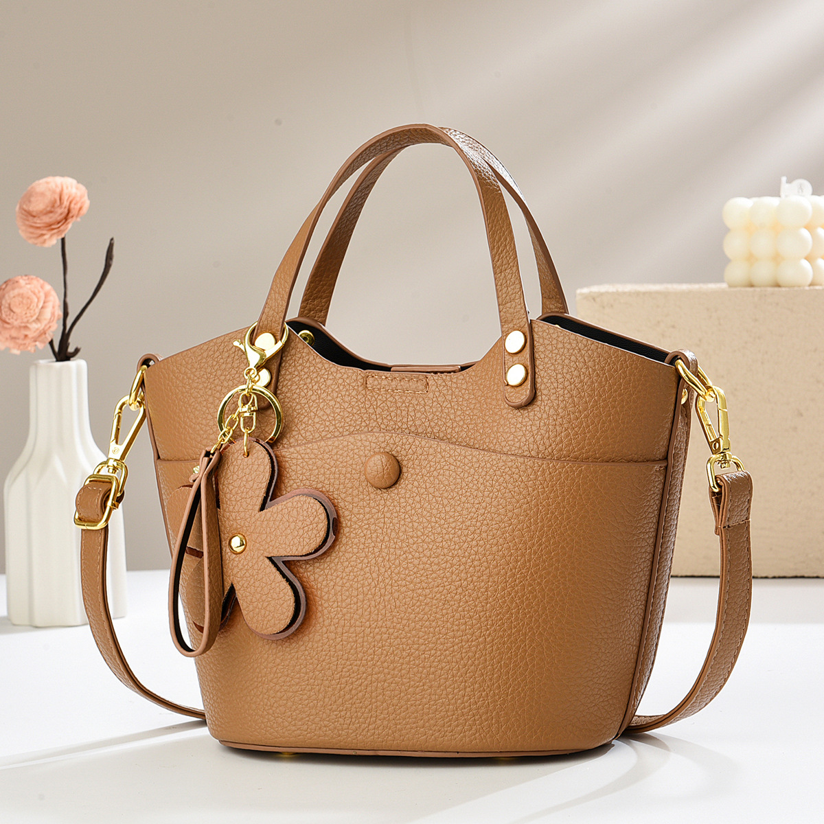 Exquisita bolsa de balde de verano 2025 nueva bolsa de hombro versátil textura mochila bolsos casuales bolsos transfronterizos