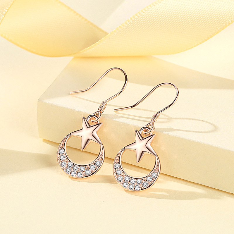 S925 nuevo estilo coreano pendientes de plata estrella Luna personalidad transfronteriza europea y americana pendientes de moda joyería al por mayor