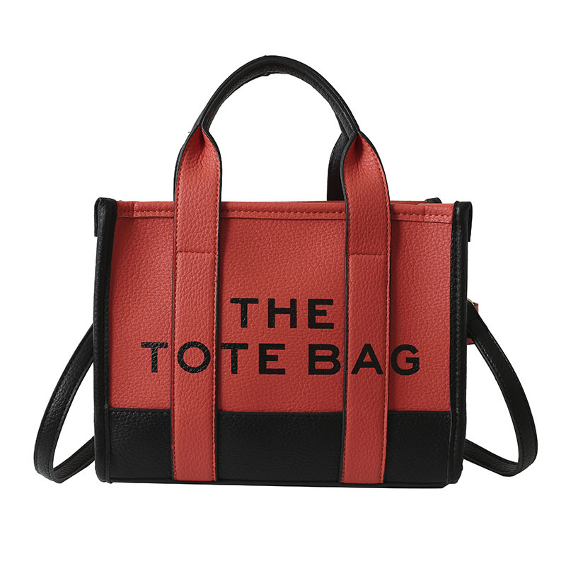 Bolso tote de comercio exterior para mujer 2023, nuevo bolso de mano moderno europeo y americano, bolso bandolera con estampado de letras y bloques de color.