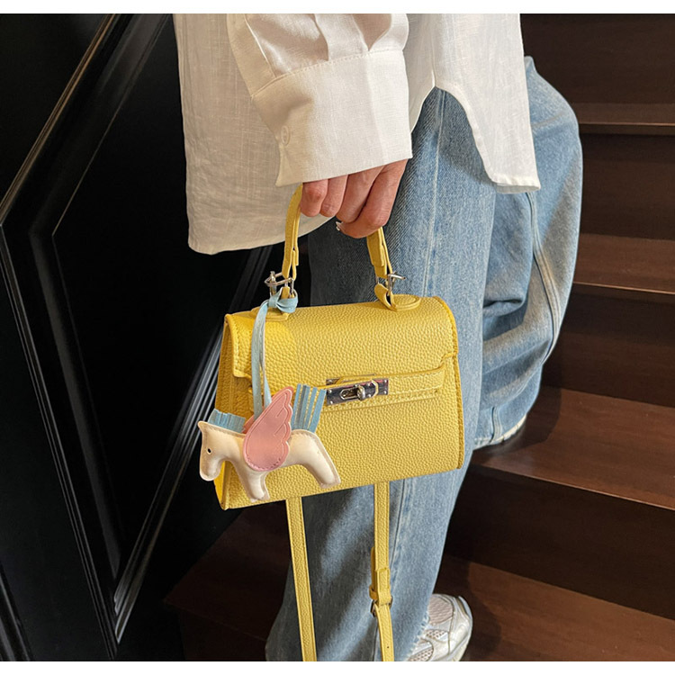 The Korean version of the hand-held small square bag for women in 2025, a new single-shoulder bag with a niche design, simple and versatile, trendy crossbody Kelly bag undefined