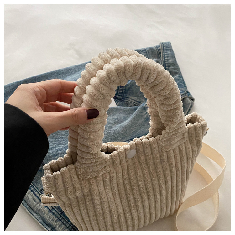 2025 New niche and fresh bucket bag, cute, fashionable and casual crossbody bag, versatile solid color handbag wholesale undefined