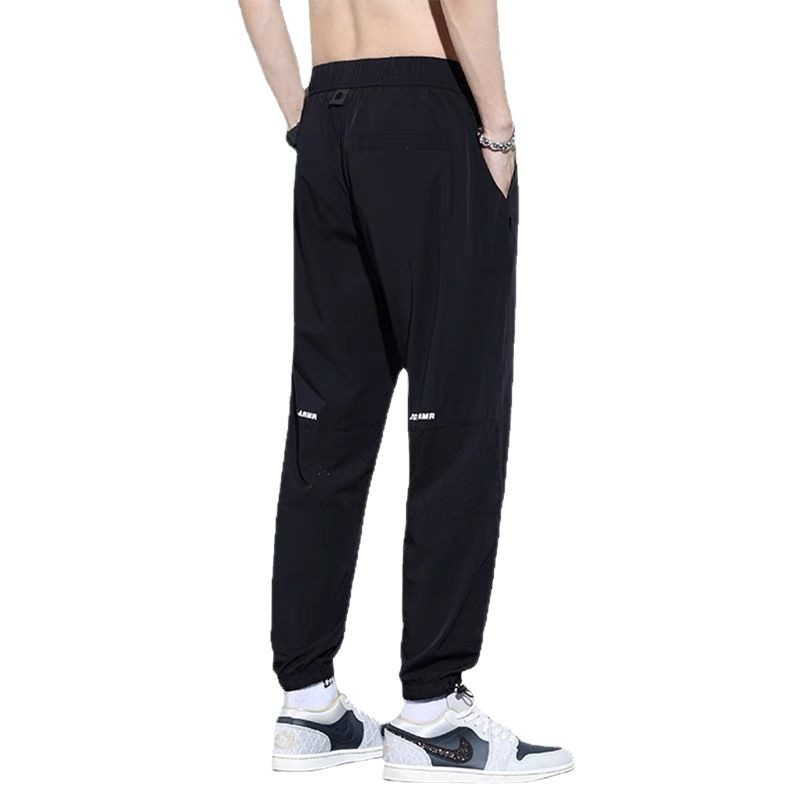 Pantalones casuales de seda de hielo, estilo fino de verano transpirable, secado rápido, marca de marea suelta, deportes harem, pantalones de ropa de primavera y otoño de nueve puntos para hombres