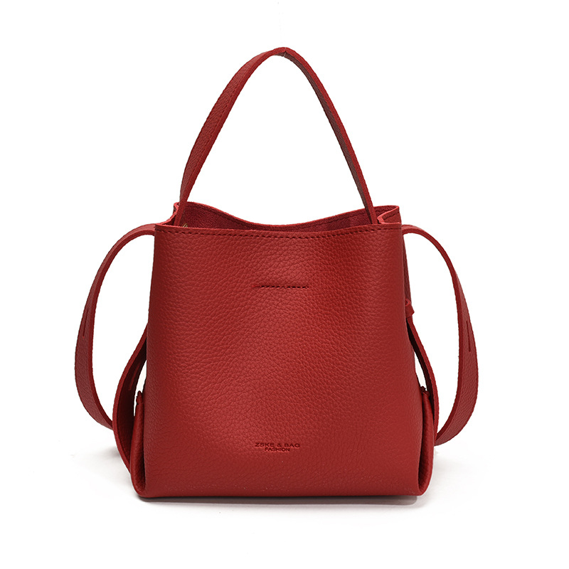 Bolso de mano de alta sensación, bolso de cubo de gran capacidad para mujeres, otoño y invierno 2025, nuevo estilo de moda bolso de hombro, bolso de mochila versátil