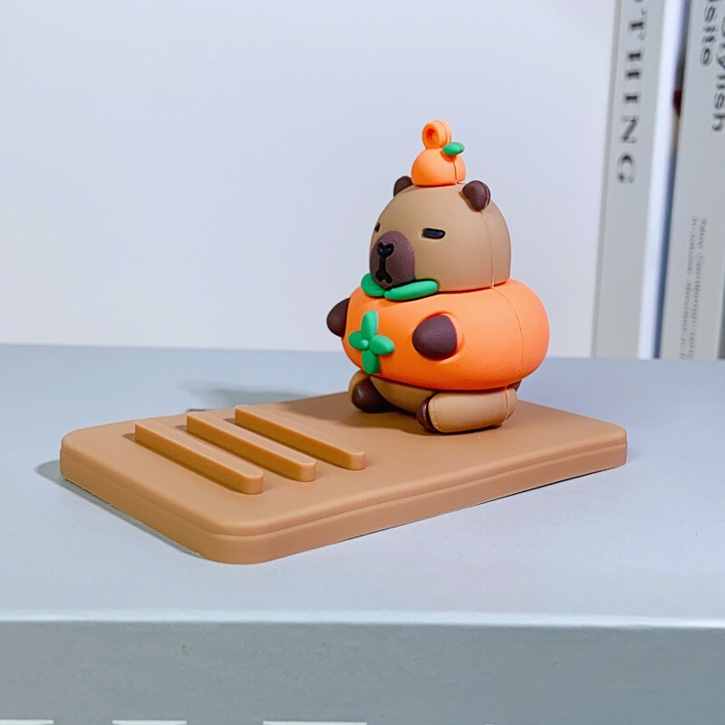 外国貿易新しいカピバラ携帯電話ホルダー漫画かわいいカピバラ人形クリエイティブデスクトップ装飾品小さなギフト|undefined