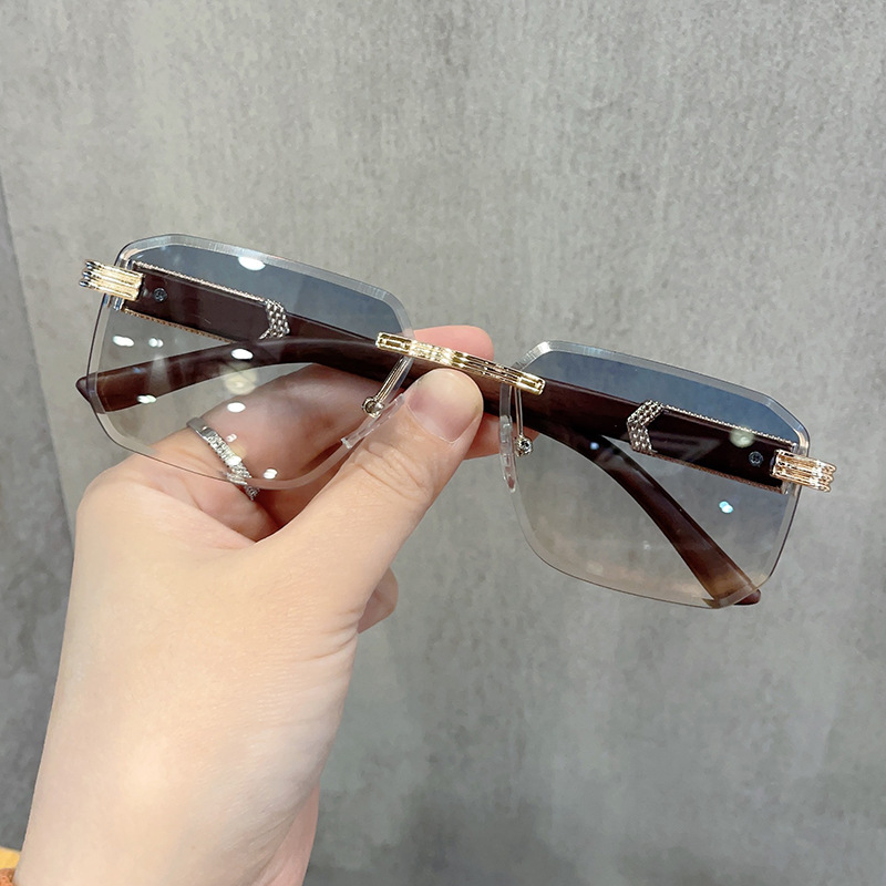 Arrow wood grain leg frameless trimming sunglasses women's fashionable irregular square glasses European and American retro trendy sunglasses