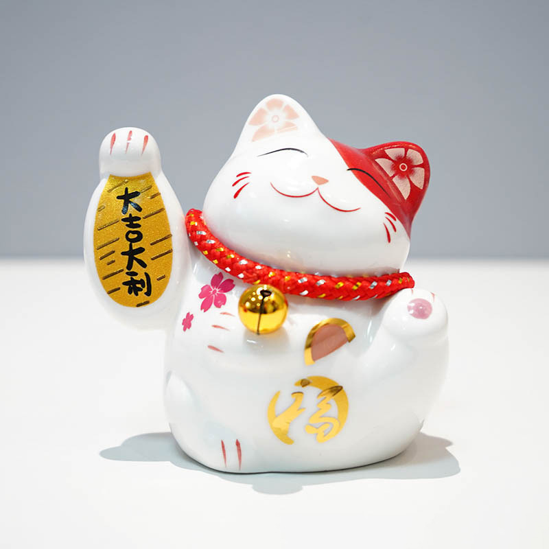 陶磁器の招き猫の貯金箱の置物の卸売り工場の店舗の開業の客間のレジの創意の贈り物の家庭の置物|undefined
