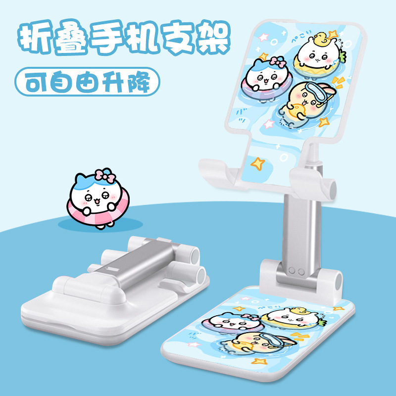 Kt猫の漫画の携帯電話の支柱はタブレットの怠け者のデスクトップの新型の生放送のネット課の神器のベッドの頭の折り畳みの支柱を適用します。|undefined