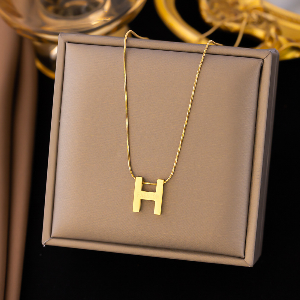 Collar al por mayor transfronterizo de las mujeres que no se desvanece elegante de lujo exquisito Acero de titanio nuevo nicho de las mujeres cadena de la clavícula de la moda del todo fósforo