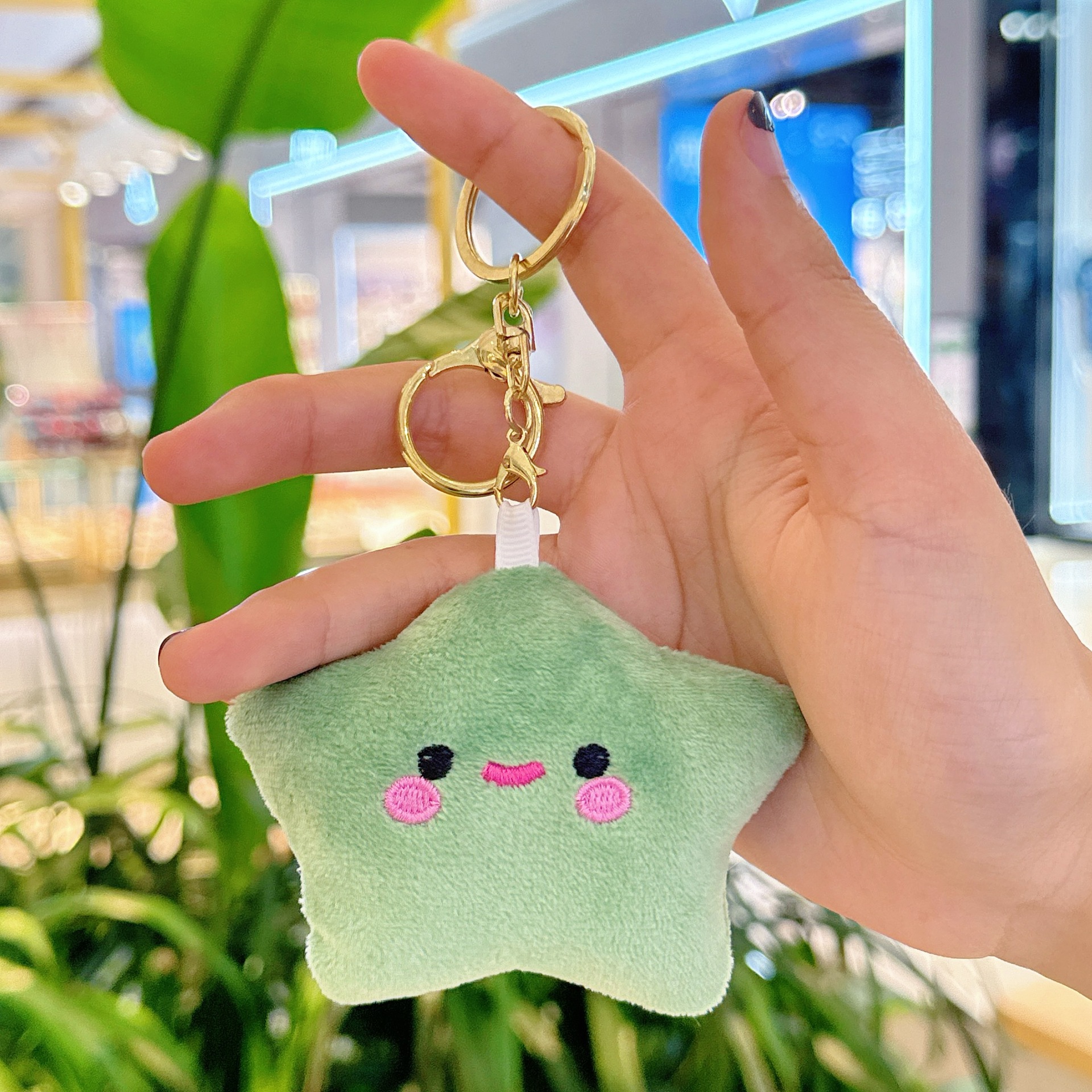 Creativa pequeña estrella llavero de peluche estrella mochila muñeca colgante muñeca juguete al por mayor