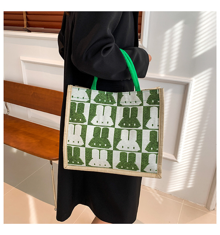 High-end mid-capacity canvas school commuting handbag 2024 new style fashionable and versatile linen single-shoulder tote bag undefined