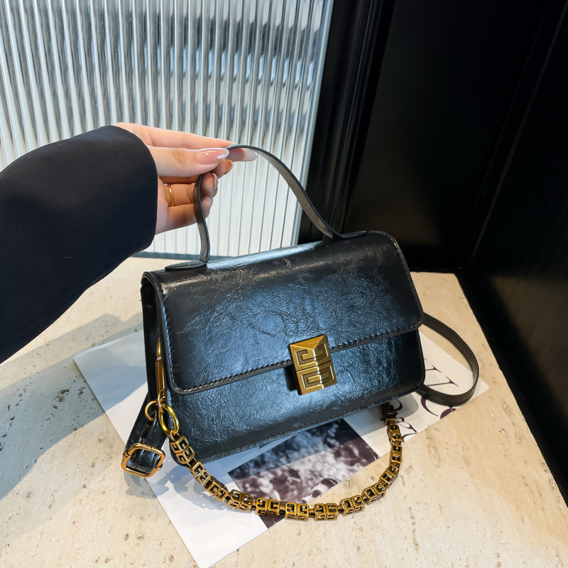 2024 Nuova trama alla moda piccola tracolla a catena quadrata casual semplice moda borsa a tracolla singola da donna_voghion.com