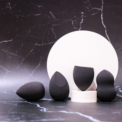 Beauty egg black color makeup egg sponge water droplet puff makeup tool non-eating powder dual-purpose ball wholesale