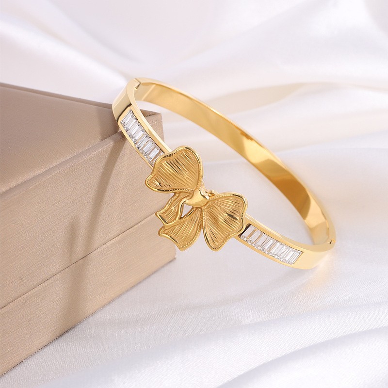 Bracelet * gold with bow
