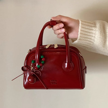 南风女包圣诞宾果枕头包包女新款真皮红色手提婚包夏天小挎包