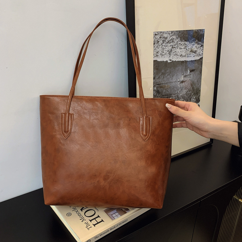 Bolso retro de gran capacidad para mujeres 2024 nueva moda coreana nicho bolso especial universal simple bolso axilar de hombro