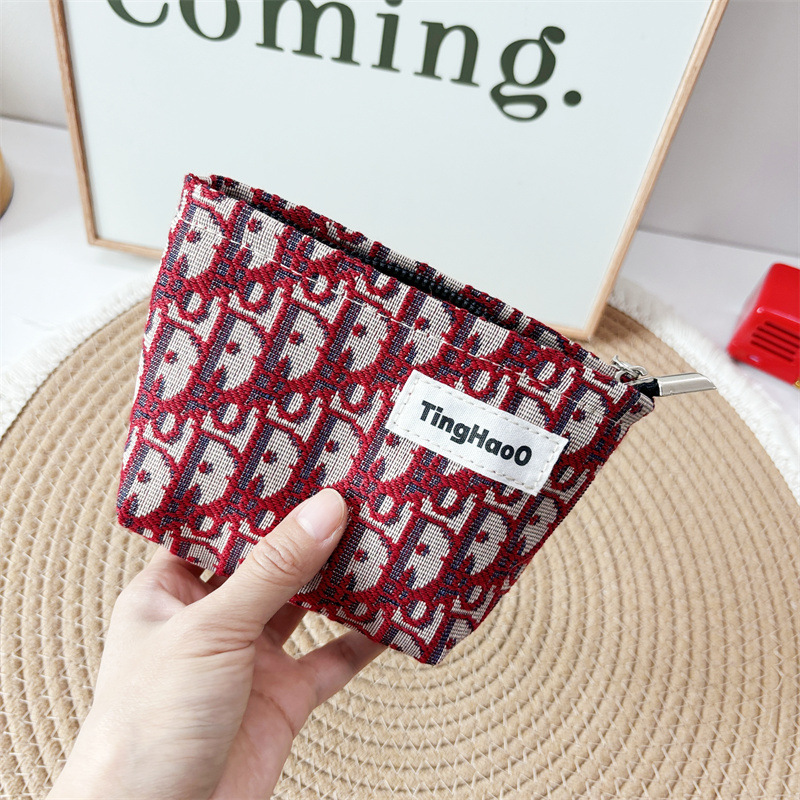 Niche Fabric Cosmetic Bag Large Capacity High-value Storage Bag Makeup Repair Bag European and American Style Clutch Bag Small Bag Women's Bag