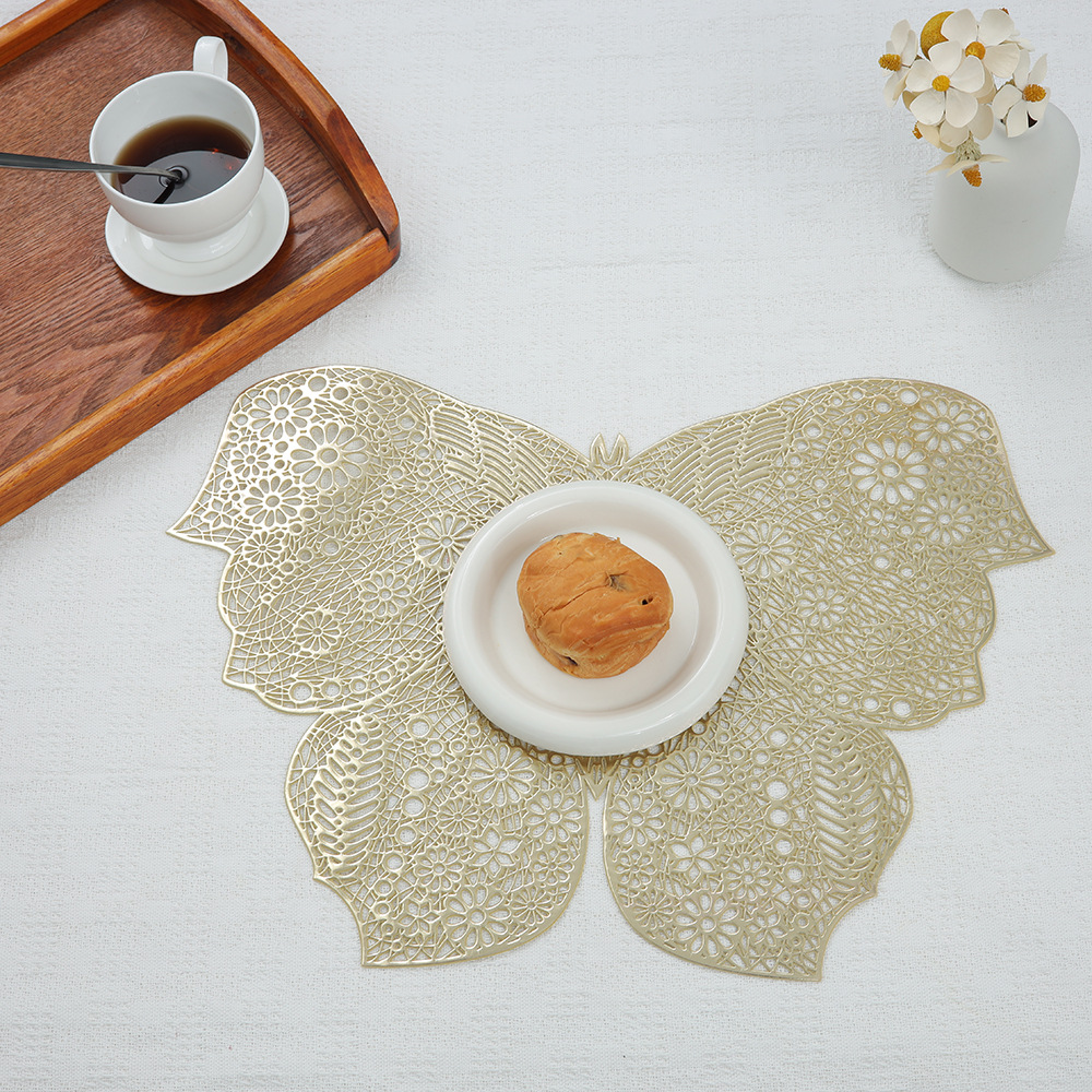 Nueva mariposa placemat hueco dorado PVC occidental placemat polvo de plata aislamiento térmico antideslizante estera de mesa de montaña restaurante Decoración