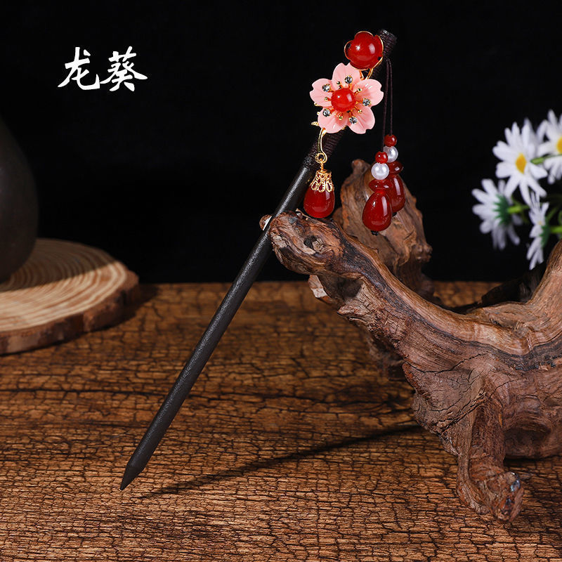 黒檀の木のかんざしのフリンジをまねて、かんざしの子供の古風な頭飾りをします。|undefined
