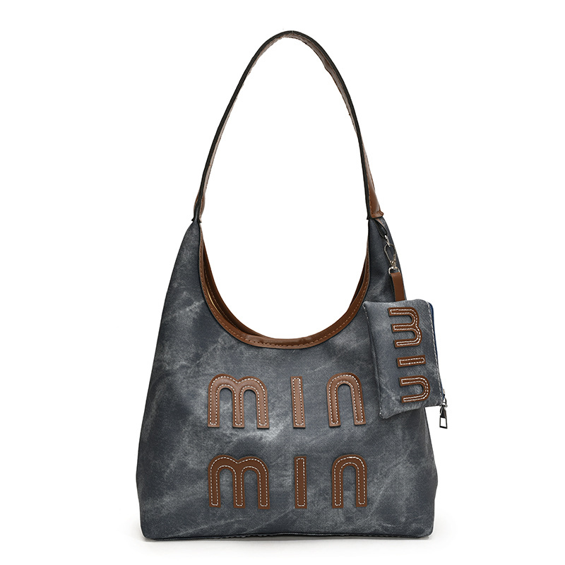 Alta sensación retro de gran capacidad 2024 nuevo estilo coreano bolso de mano de mujer de hombro de moda de viaje bolso de brazo