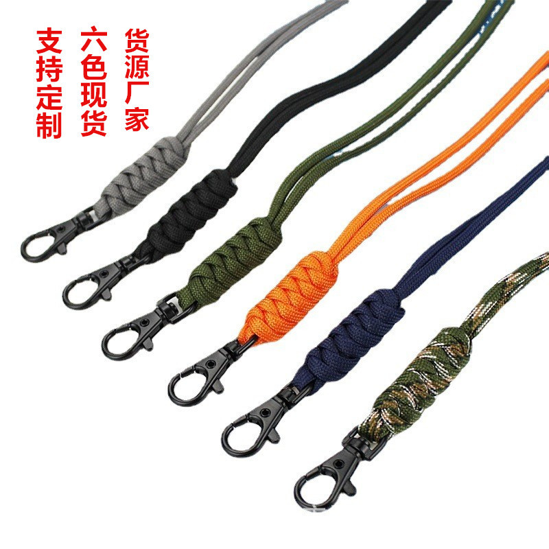En stock Certificado de ventas caja del teléfono móvil acampar al aire libre multi-funcional 4m siete-núcleo clave cuello cuerda universal anti-robo cordón