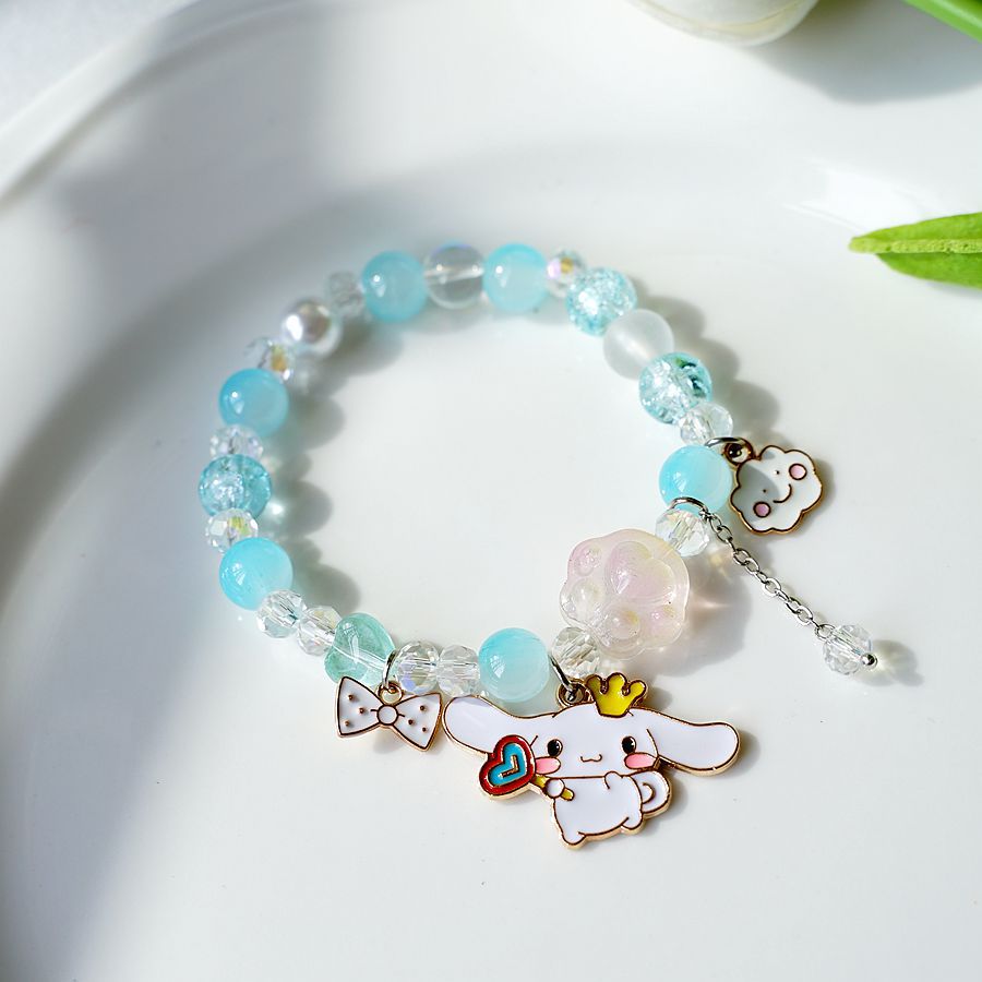 La nueva versión coreana de la caricatura Mori cristal con cuentas canela perro budín perro pulsera gato garra mano joyería piruleta canela perro a