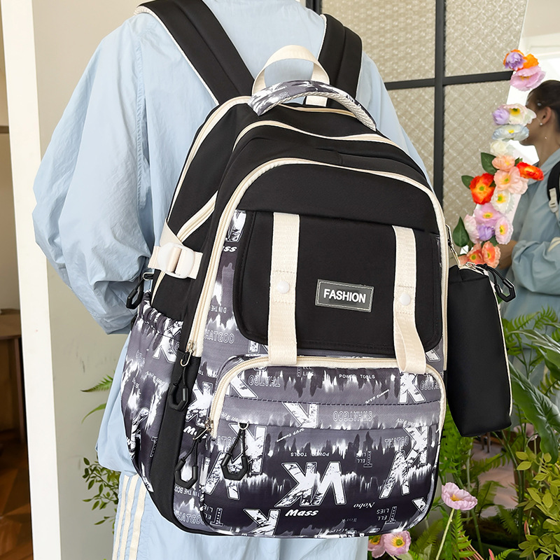 2024 nueva mochila casual de gran capacidad, mochila escolar impresa de todo fósforo de moda, mochila para estudiantes universitarios de secundaria y preparatoria al por mayor