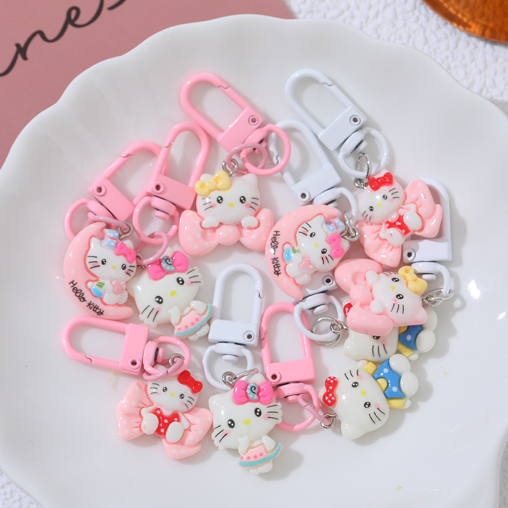 Cartoon Moon Cat DIY accesorios de resina llaveros Sanrio arco gato bolsas colgantes de chicas