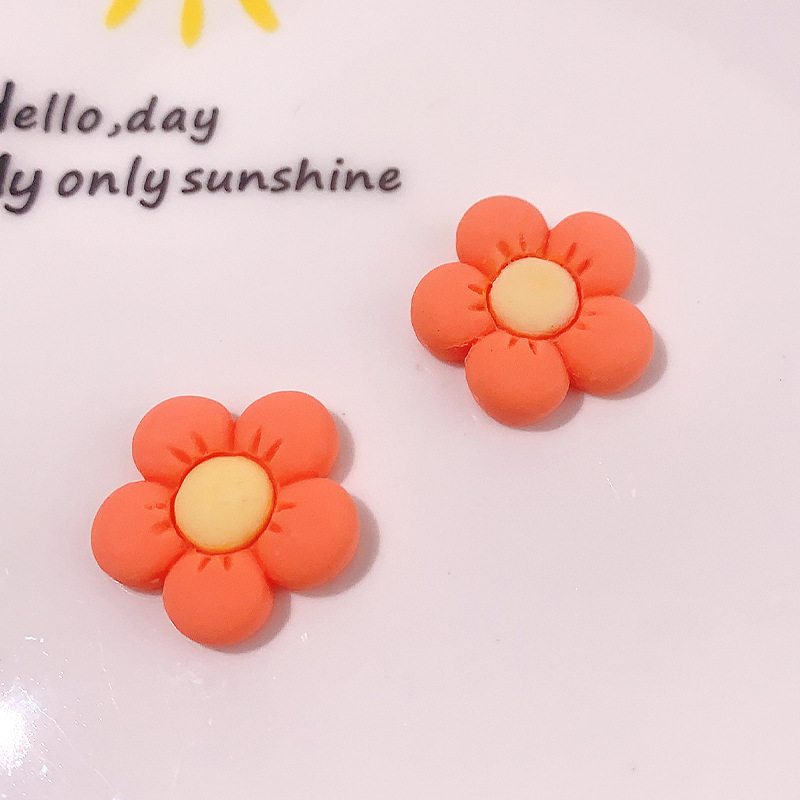 Accesorios de resina de cinco pétalos de color directo transfronterizo DIY pegamento de crema caja de teléfono móvil adornamiento de pelo agujero material de hebilla de zapatos