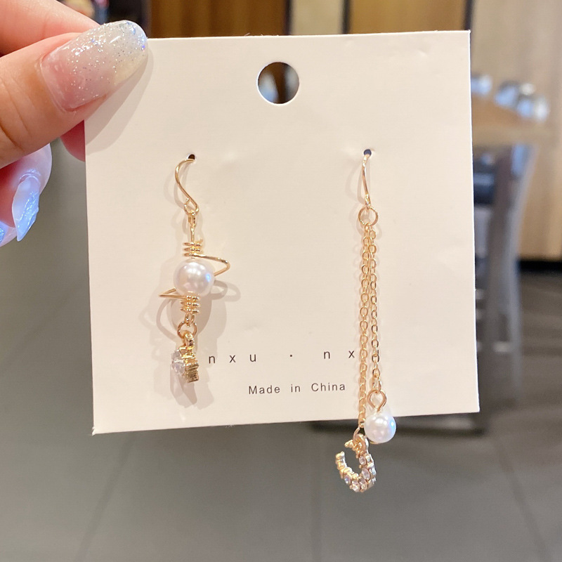 Pendientes transfronterizos, pendientes de metal de alta calidad, pendientes de 2025 nuevos pernos de moda, temperamento ligero y lujoso, pendientes de atmósfera