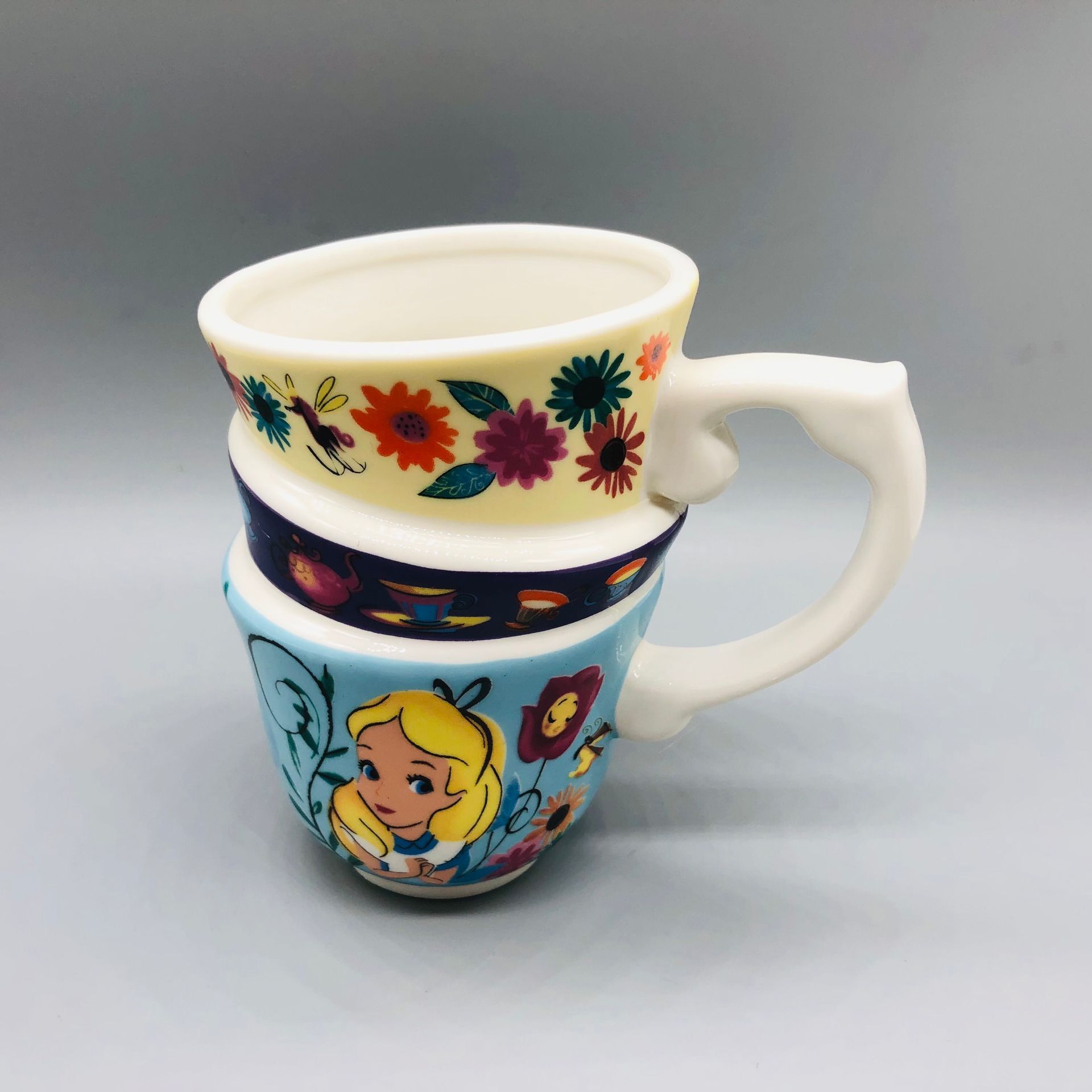 Alicia en el país de las Maravillas taza de agua apilados taza de dibujos animados personalidad de tres capas de cerámica taza de café taza titular de la pluma