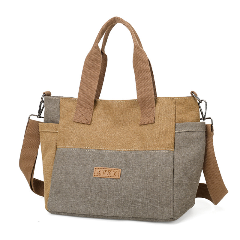 2026 bolsas de lona para mujeres nuevas bolsas de mochila casuales TOT con estilo coreano simple y gran capacidad bolsas de hombro