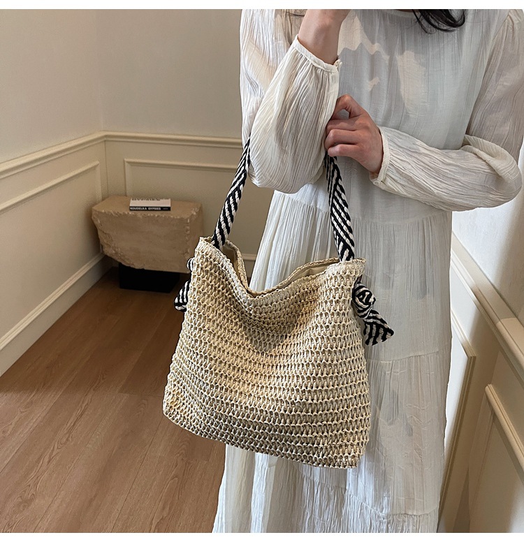 Summer large-capacity straw woven bag for women, 2025 new style seaside and beach vacation single-shoulder bag, commuter tote bucket bag undefined