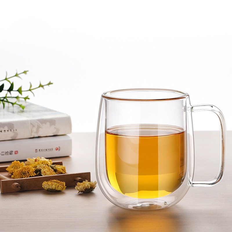 Los fabricantes suministran aislamiento térmico borosilicato de doble capa de vidrio grande del vientre taza resistente al calor taza de café de color de una sola capa creativa
