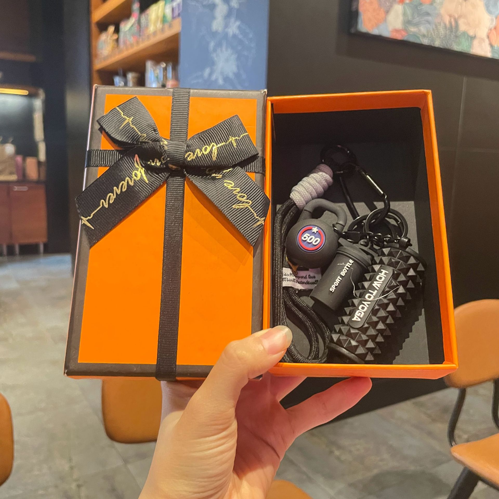 Black set for yoga from foam, orange gift box