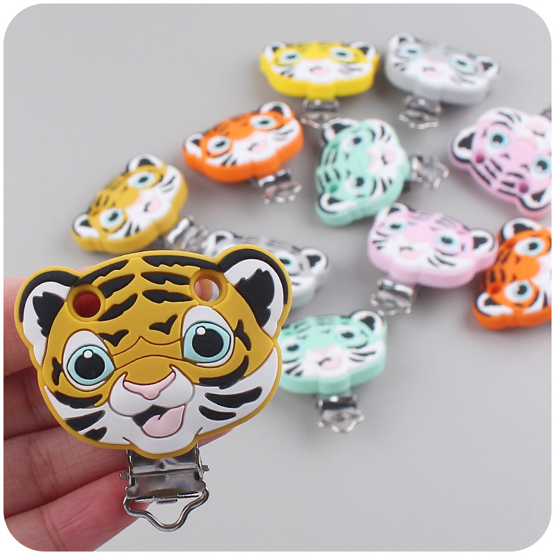 Nuevo bebé suministros de dibujos animados de silicona animal Tigre forma calmante bebé chupete de silicona anti-gota clip de cadena