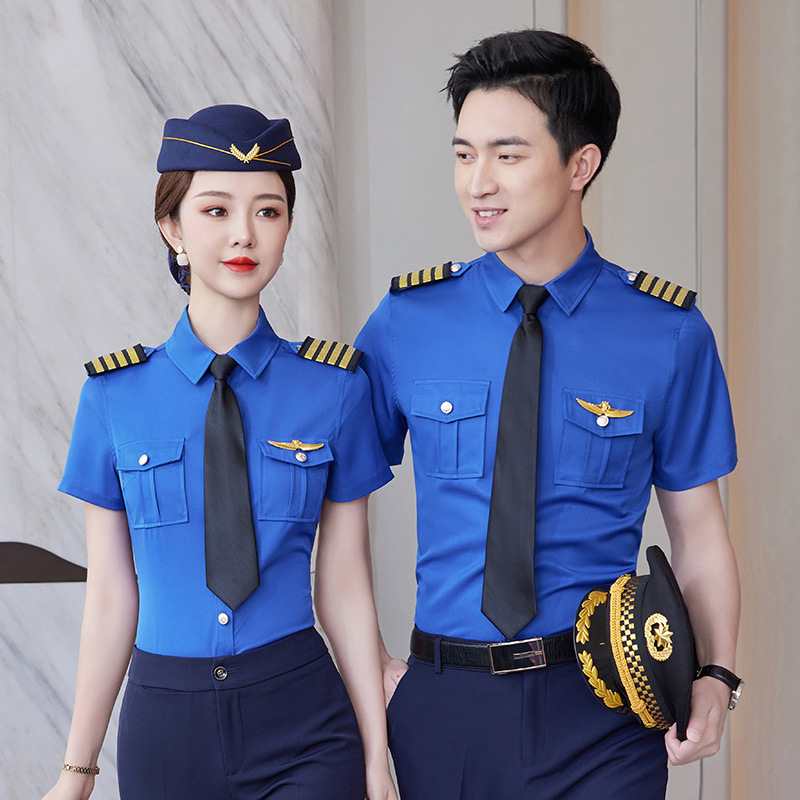 半袖の男女のシャツの青いシャツのスチュワーデスの空の少ないパイロットの機長の航空制服の警備員の作業服