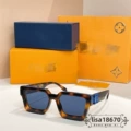 Tortoiseshell frame blue lenses